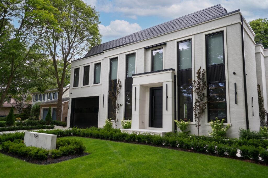 Isabella residence — transitional exterior and landscaped front entrance